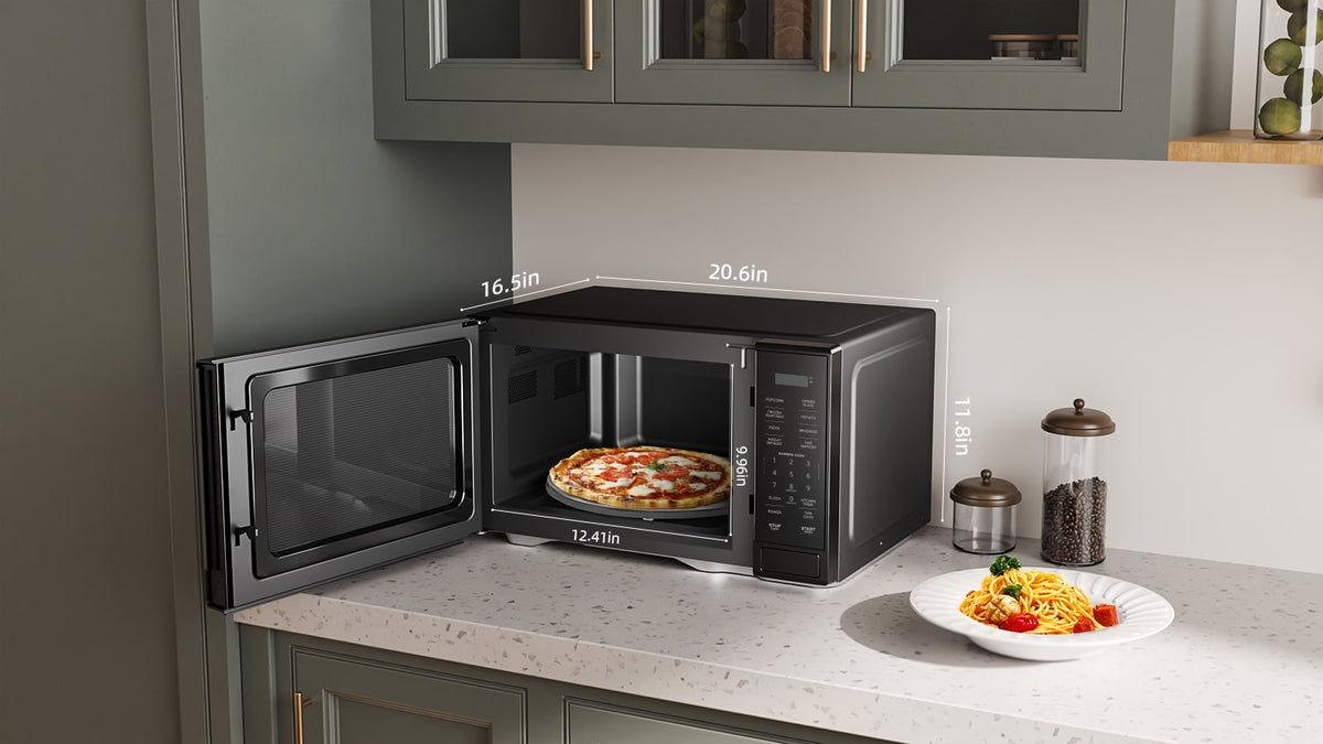 Mainstays Countertop Microwave Oven, Automatic Defrost, 1000W, 1.1 cu ft, Black — reference 3